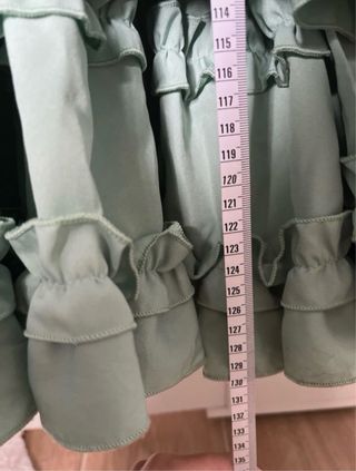 Traje de flamenca verde con volantes