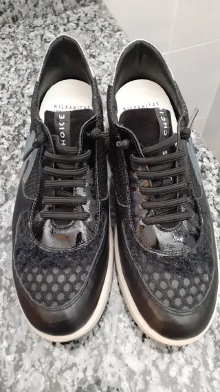 Sneakers de piel negras y plateadas