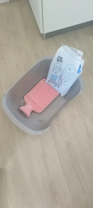 Arenero para animales pequeño y bolsa agua calient