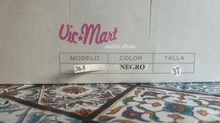 Botas altas de cuero negras con hebilla