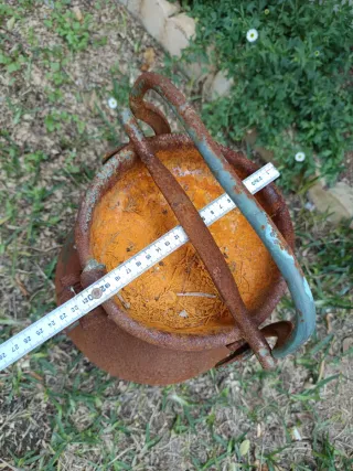 Lechera antigua metálica oxidada