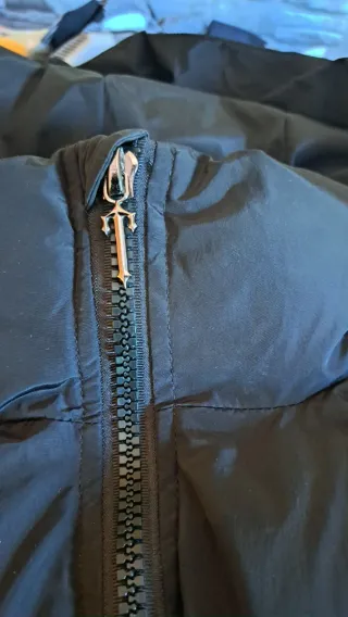 Plumas negra acolchada hombre