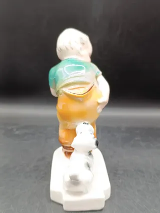 Figura niño con perro porcelana alemana