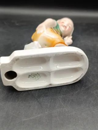 Figura niño con perro porcelana alemana