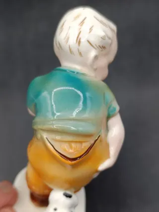 Figura niño con perro porcelana alemana