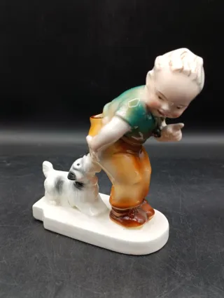 Figura niño con perro porcelana alemana