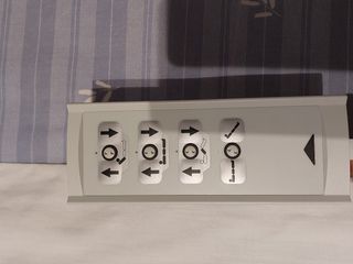 Cama articulada nueva y silla para ducha.