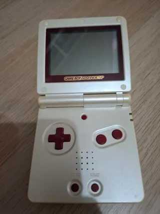 Nintendo GameBoy SP versión farmicon regalo juego