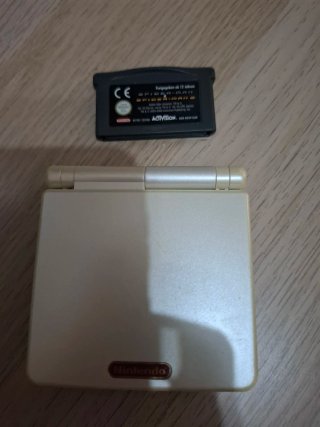 Nintendo GameBoy SP versión farmicon regalo juego