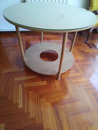 Mesa camilla redonda con cristal.