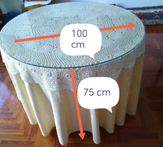 Mesa camilla redonda con cristal.
