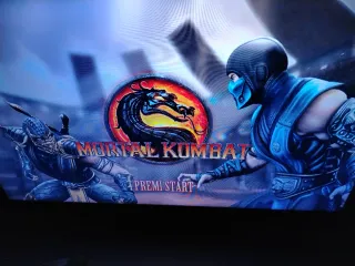 Xbox 360: Mortal Kombat, GTA IV, Assassin's Creed,