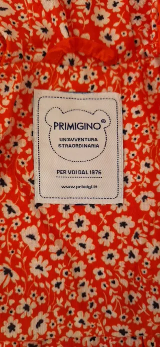 Giacca a vento bimba arancione con fiori