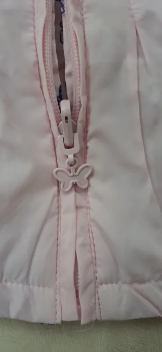 Giacca a vento bimba rosa con fiocchi
