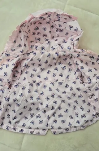 Giacca a vento bimba rosa con fiocchi
