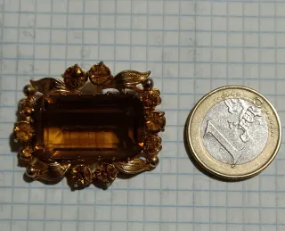 Broche vintage con pietra d'ambra