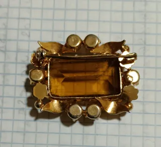 Broche vintage con pietra d'ambra