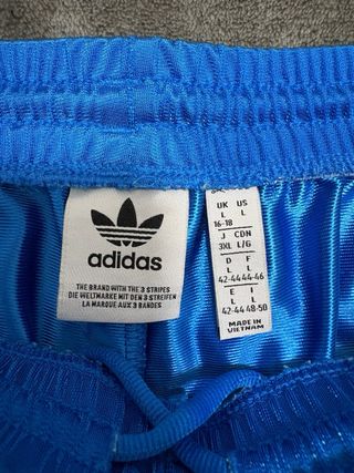 Adidas tuta blu con aperture laterali