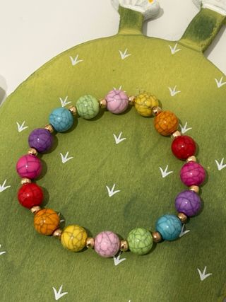 Bracciale elastico multicolor con perline dorate