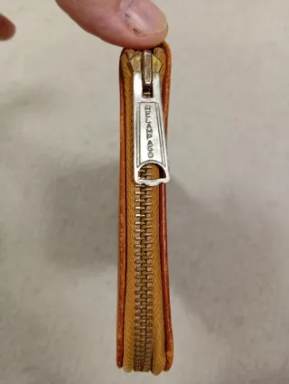 Cartera de cuero vintage con diseño azteca