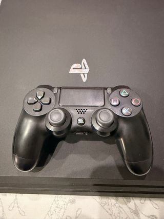 Consola PS4 Pro + 6 Juegos + Mando