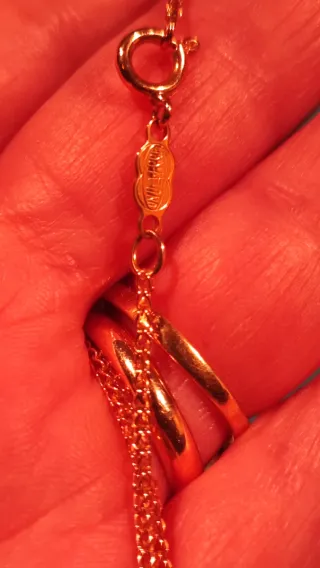 Collana in oro 750 e diamante  con pendente rombo