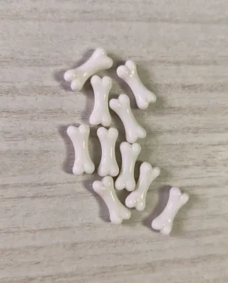 Perline a forma di osso per miniature