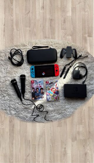 Nintendo Switch + Accesorios y Juegos