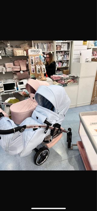 Carro de bebé rosa y azul