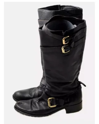 Botas altas de cuero negras con hebillas