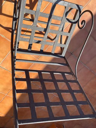 4 Sillas de terraza de hierro forjado.