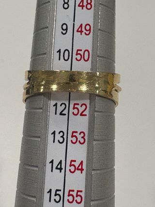 Anillo oro con circonita.