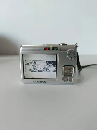 x21€ acepto)Olimpus Cámara FE-210 7.1 M