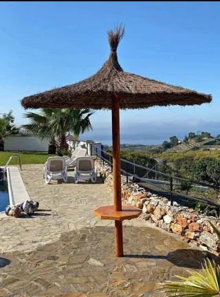 Reparación y fabricación de sombrillas y pérgolas