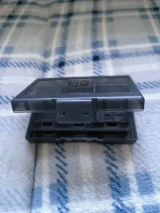 Caja de juegos Nintendo Switch (1/2)