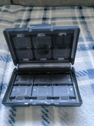 Caja de juegos Nintendo Switch (1/2)