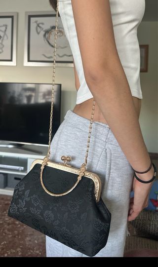 Bolso de mano vintage negro y dorado