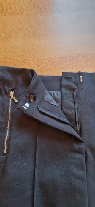 Falda negra cremallera cintura 81cm