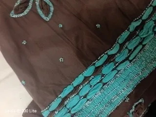 Vestido gasa y pedrería marrón y turquesa