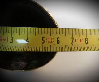 Antigua campanilla de bronce y hierro