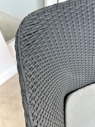 Sillón exterior negro con cojín gris