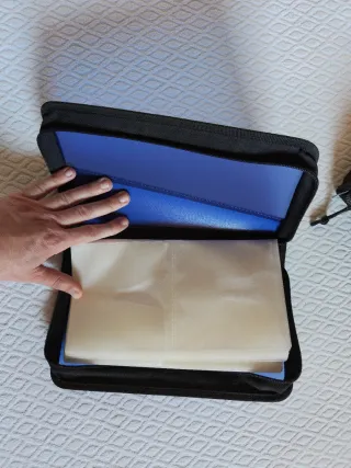 Porta CD Eastpak e due di altre marche