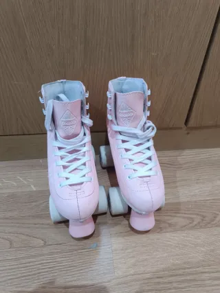 Patines rosas Oxelo + mochila