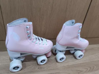 Patines rosas Oxelo + mochila