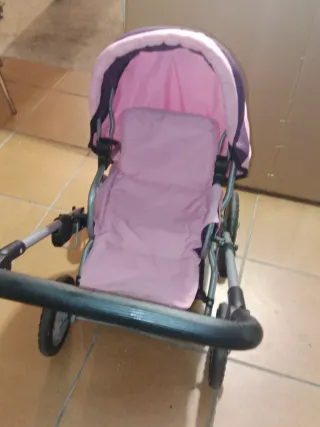 Carrito de muñecas rosa y morado