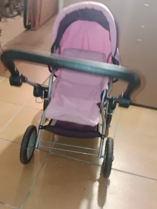 Carrito de muñecas rosa y morado