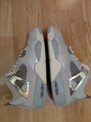 Jordan 4 Retro Frozen Moments