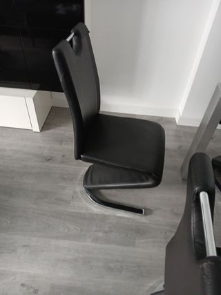 Mesa extensible cristal y 8 sillas diseño