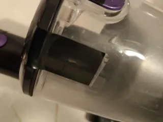 Aspiradora de mano morada