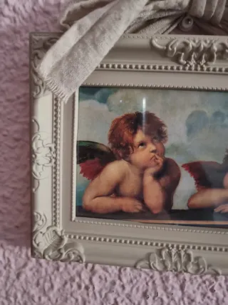 Dos marcos con la lámina de angelitos